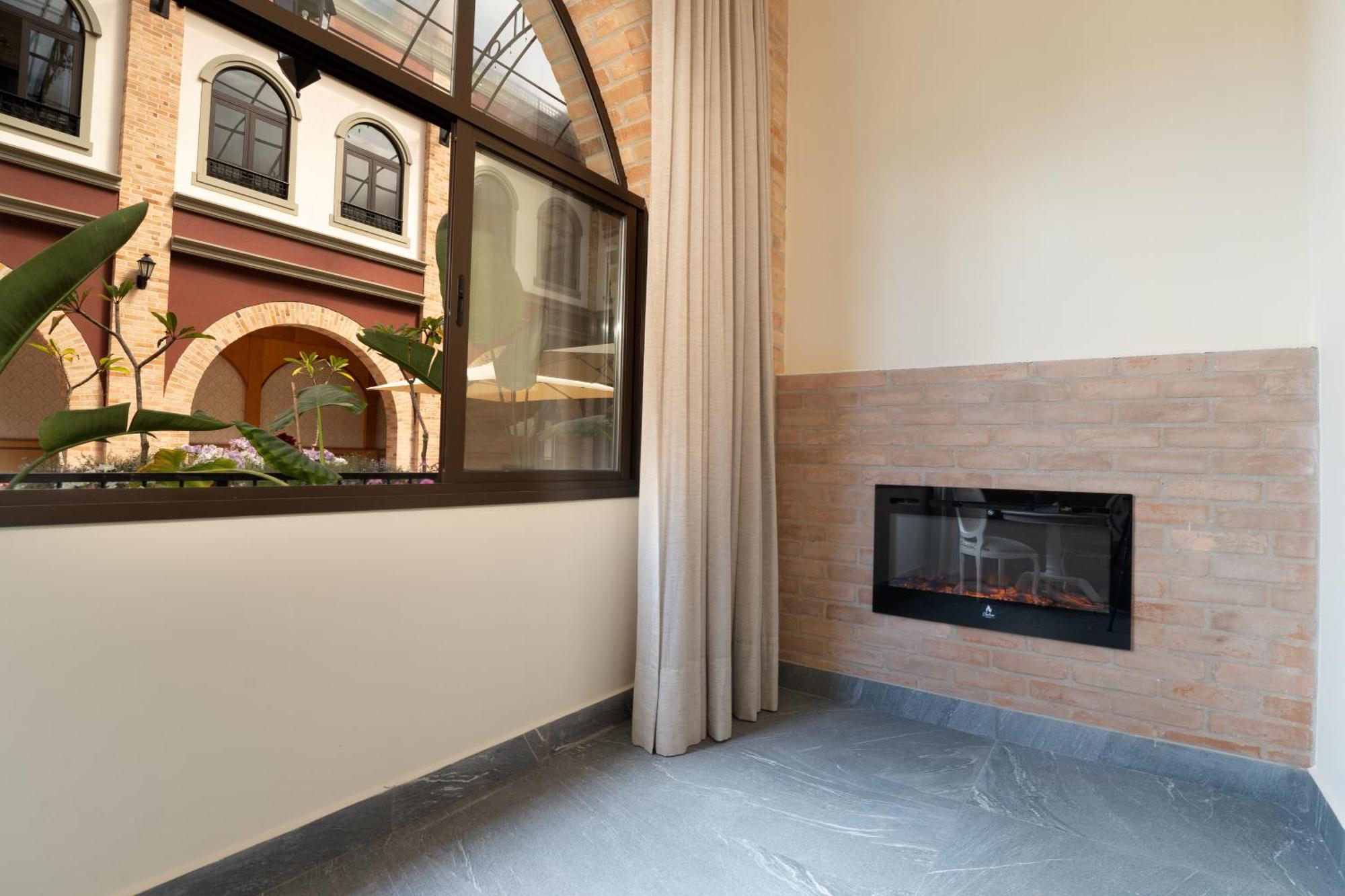Pousada Luis XV Campos do Jordão Kültér fotó A fireplace in a home
