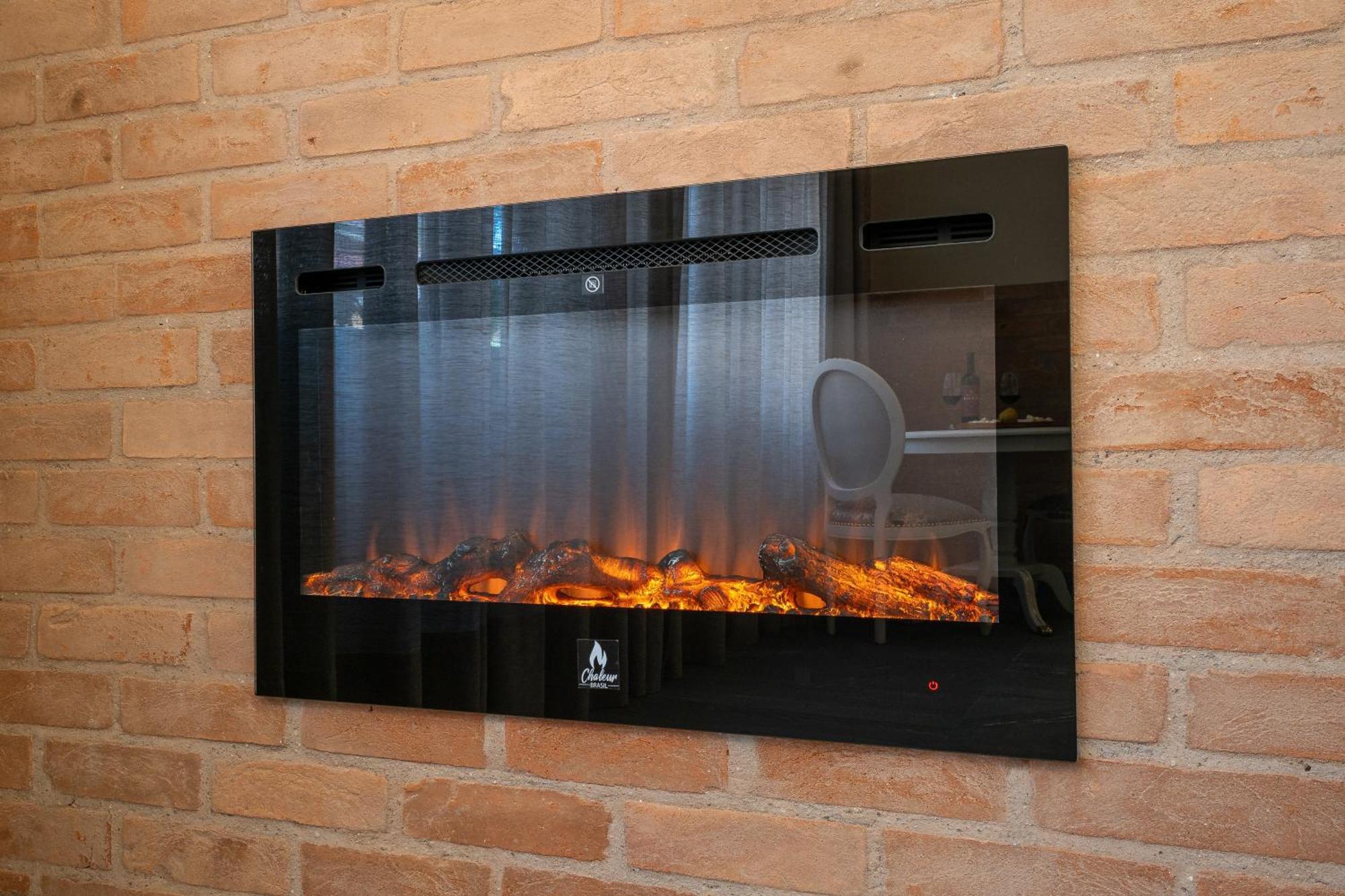 Pousada Luis XV Campos do Jordão Kültér fotó A wall mounted electric fireplace